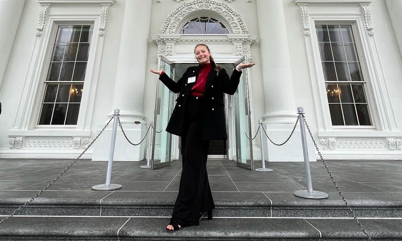  Student standing on steps